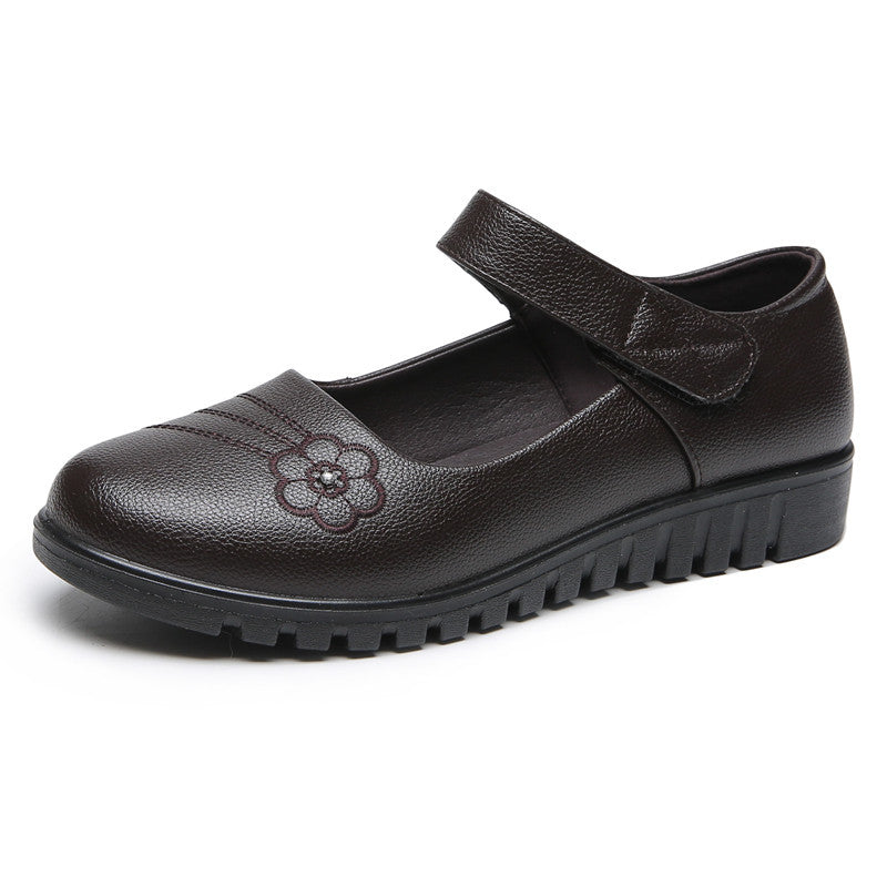 Zapatos de piel con velcro y pequeñas flores