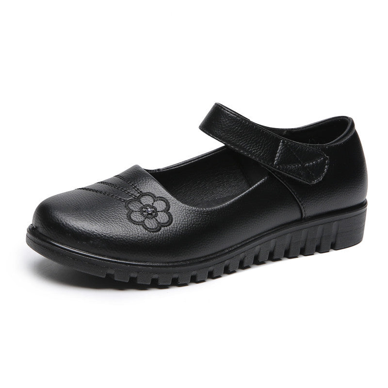 Zapatos de piel con velcro y pequeñas flores