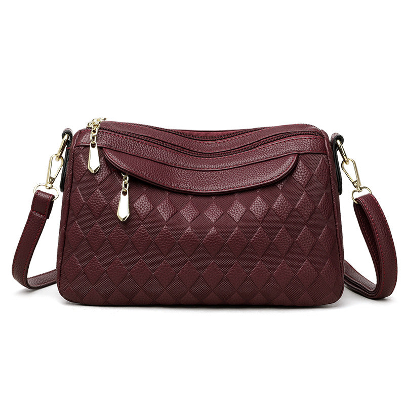 Bolso cruzado a cuadros elegante y versátil