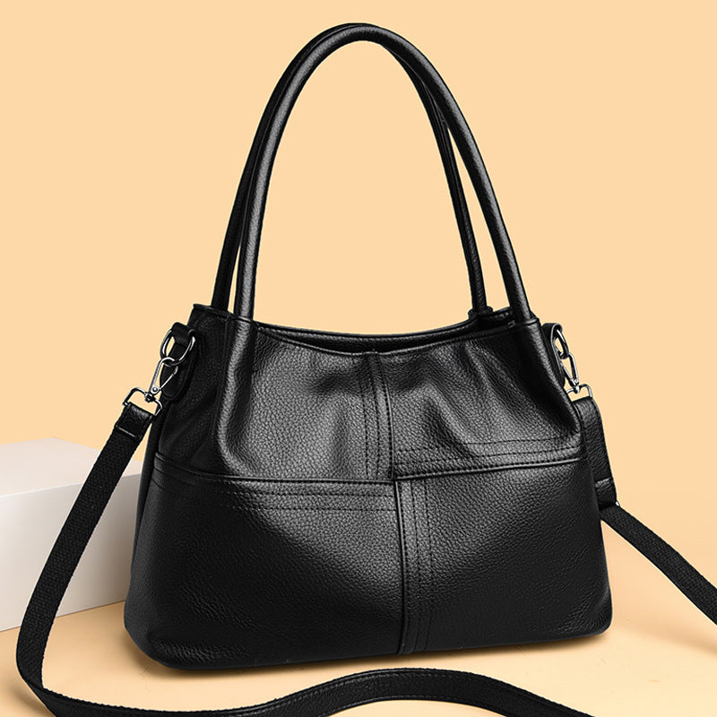 Bolso de mano de piel suave con textura de patchwork para mujer.