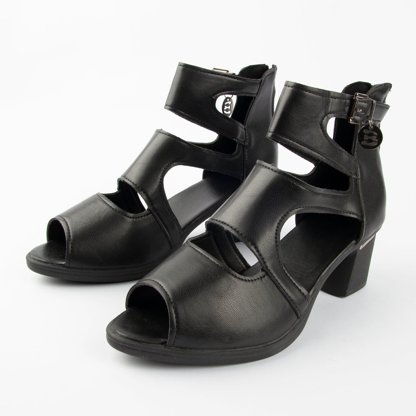 Zapatos de tacón alto romanos de piel suave con diseño de punta abierta.