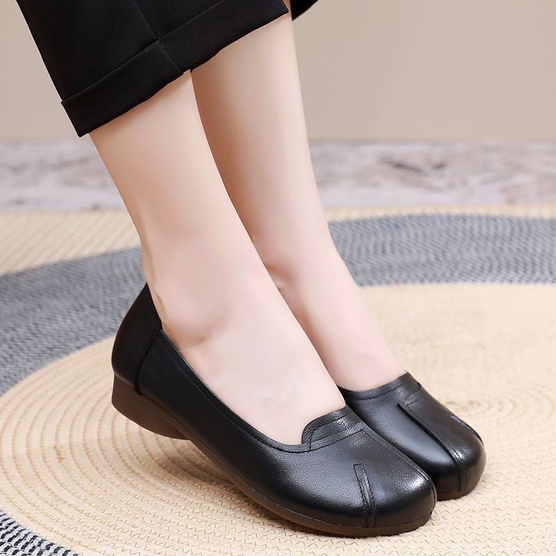 Zapatos cómodos de cuero con suela blanda y punta redonda