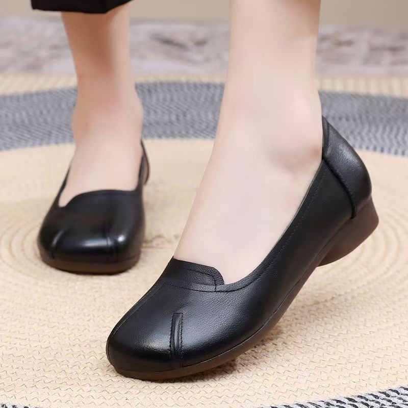 Zapatos cómodos de cuero con suela blanda y punta redonda