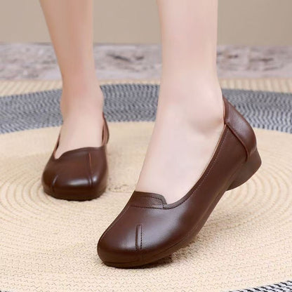 Zapatos cómodos de cuero con suela blanda y punta redonda