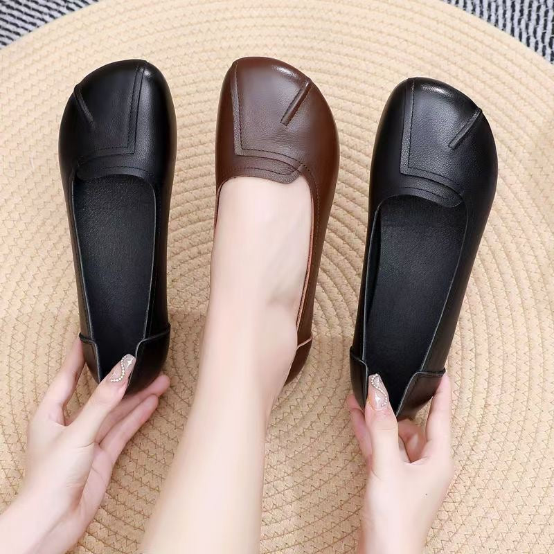 Zapatos cómodos de cuero con suela blanda y punta redonda