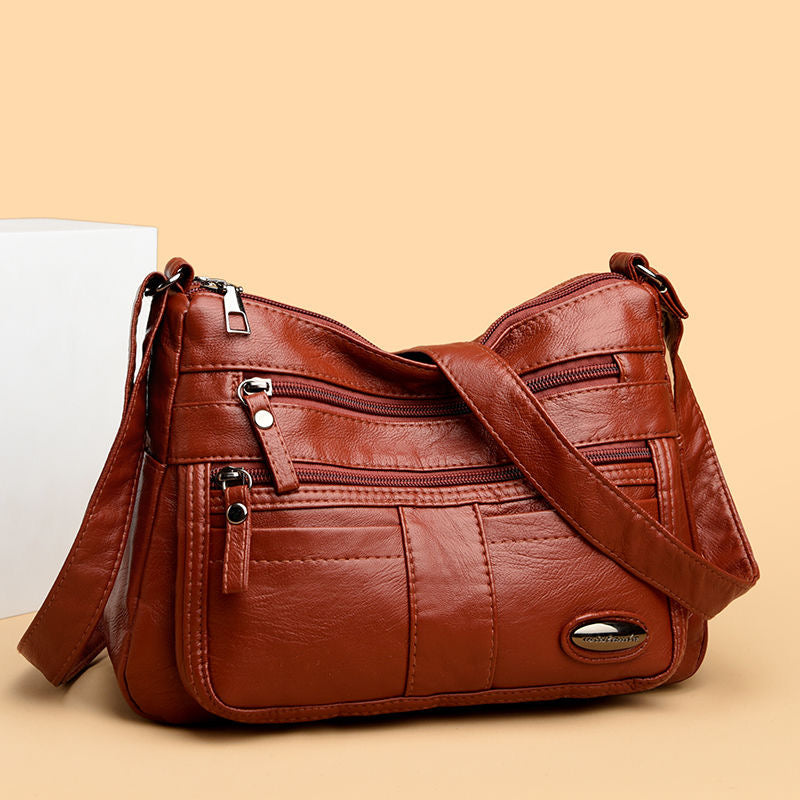 Bolso de piel con cuentas ovaladas