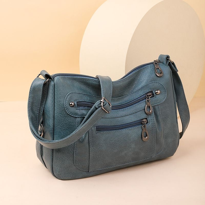 Bolso vintage de piel suave con textura