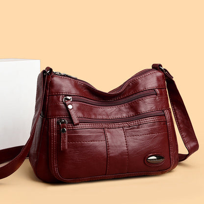 Bolso de piel con cuentas ovaladas