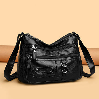 Bolso de piel con doble anilla