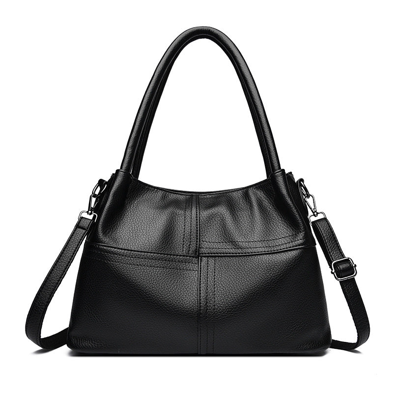 Bolso de mano de piel suave con textura de patchwork para mujer.
