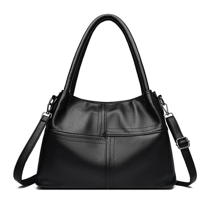 Bolso de mano de piel suave con textura de patchwork para mujer.