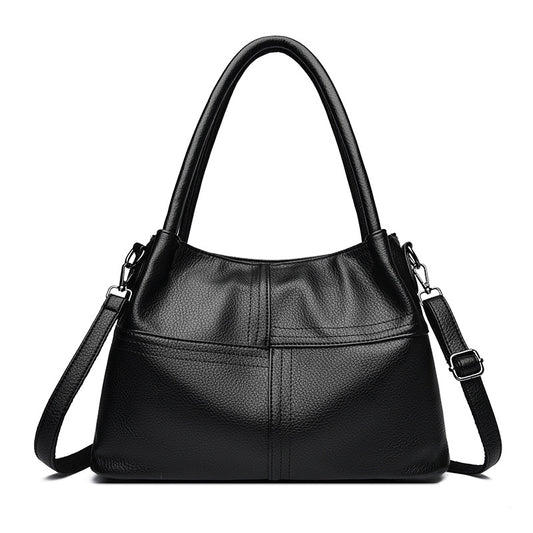 Bolso de mano de piel suave con textura de patchwork para mujer.