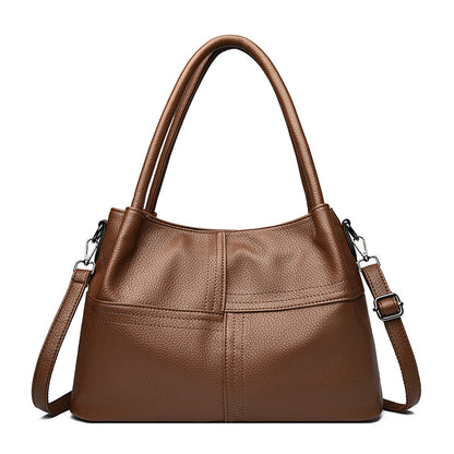 Bolso de mano de piel suave con textura de patchwork para mujer.