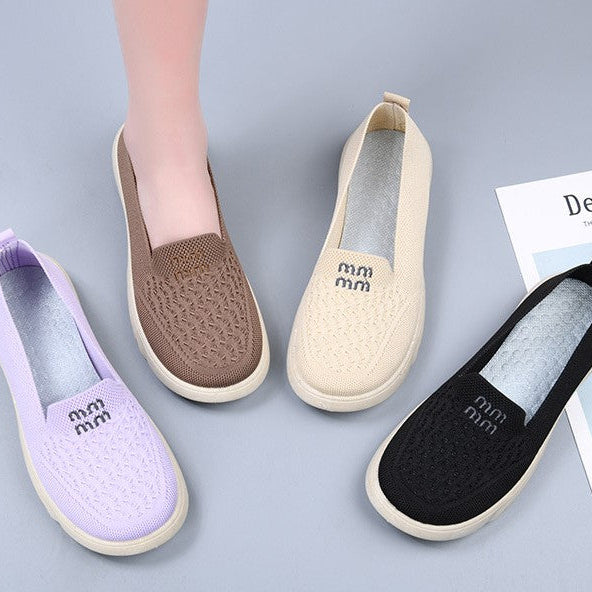 Zapatos de malla transpirables y cómodos con punta redonda.