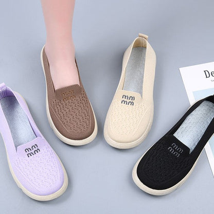 Zapatos de malla transpirables y cómodos con punta redonda.