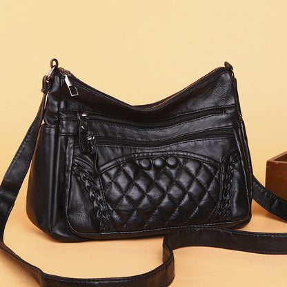 Bolso bandolera multicapa de piel suave