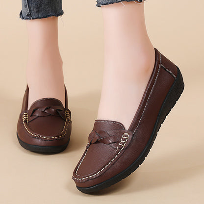 zapatos de cuero retorcido