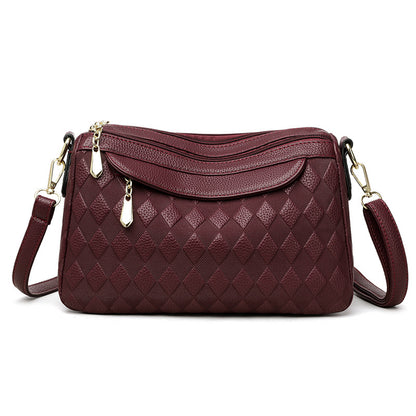 Bolso cruzado a cuadros elegante y versátil