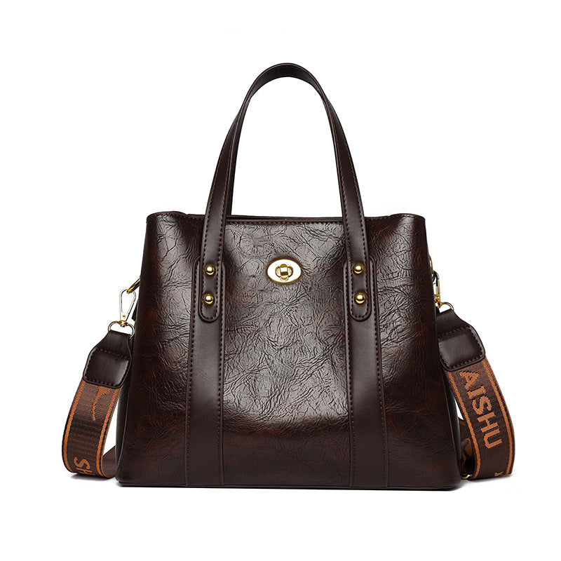 Bolso de mano de cuero suave bicolor