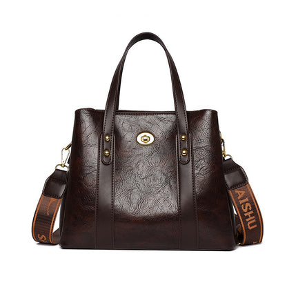 Bolso de mano de cuero suave bicolor