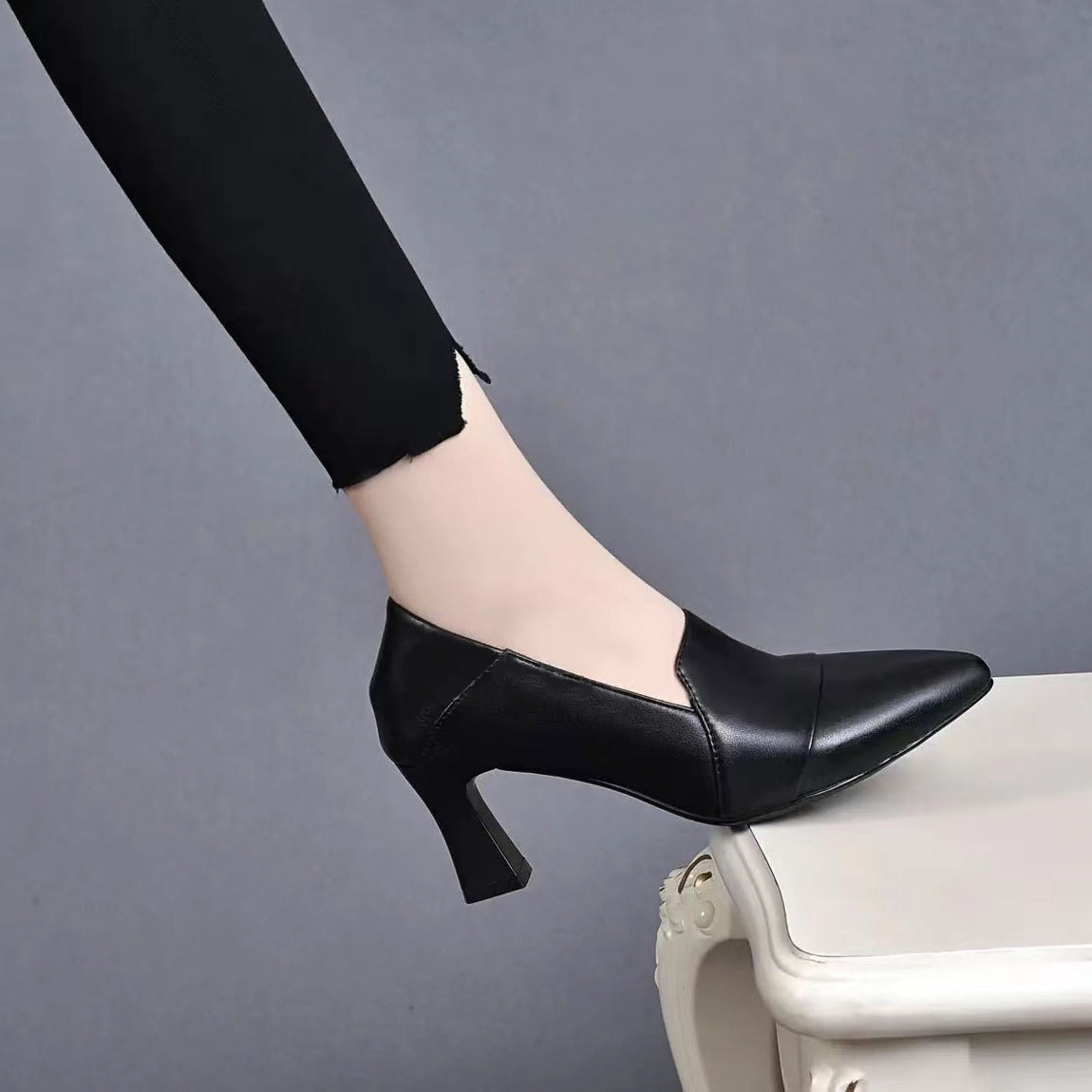 Zapatos de piel con tacón cruzado