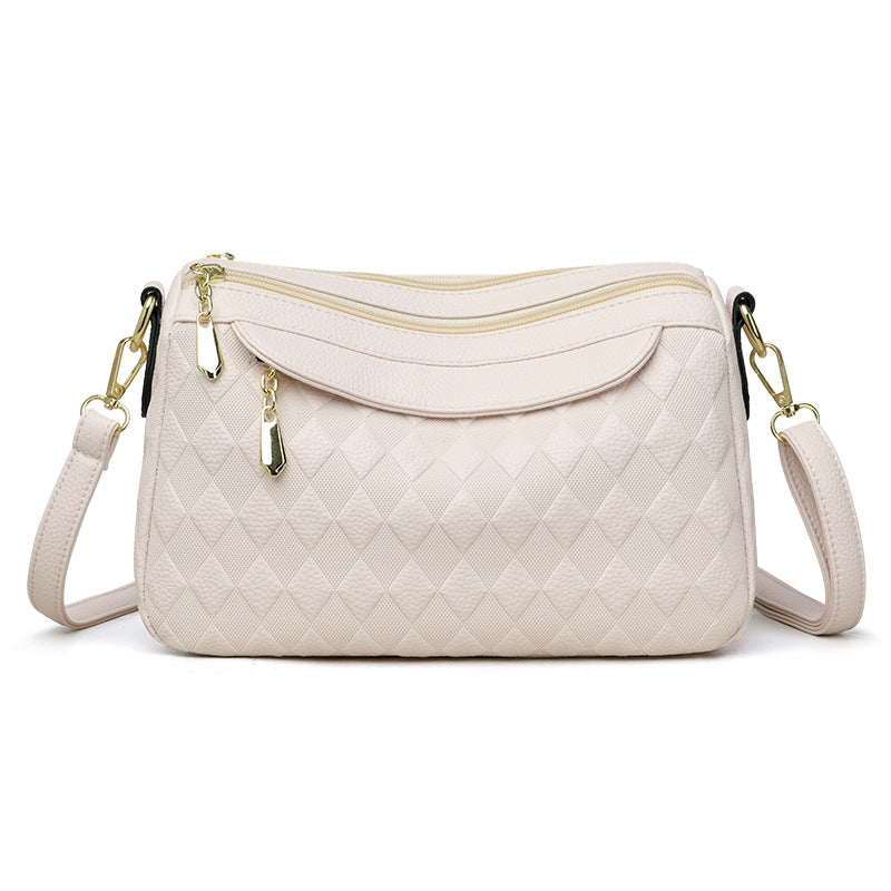 Bolso cruzado a cuadros elegante y versátil