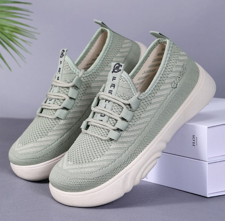 Zapatos de malla con suela ondulada y rayas