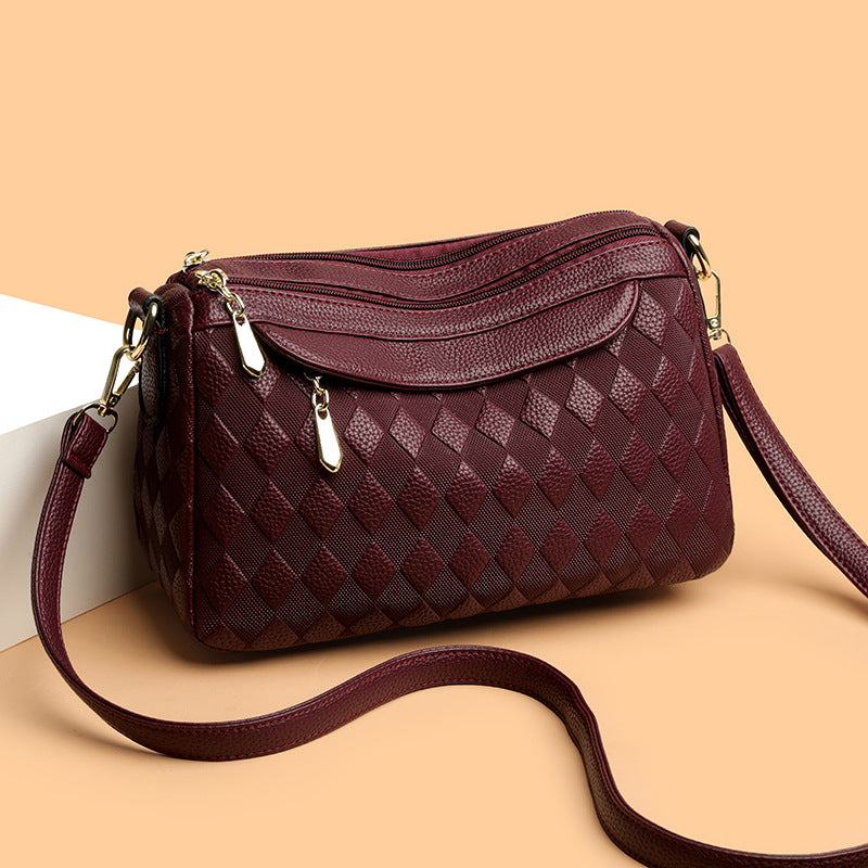 Bolso cruzado a cuadros elegante y versátil