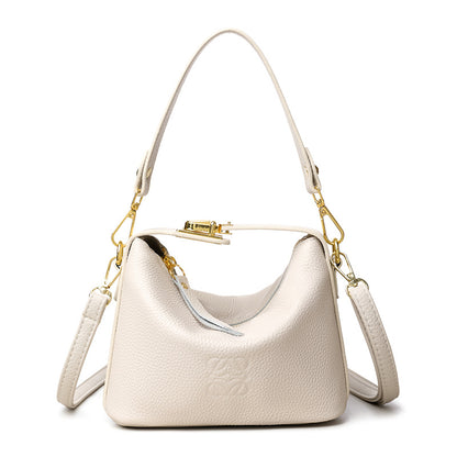 Nuevo bolso premium para mujer de cuero genuino liso con cierre de cerradura