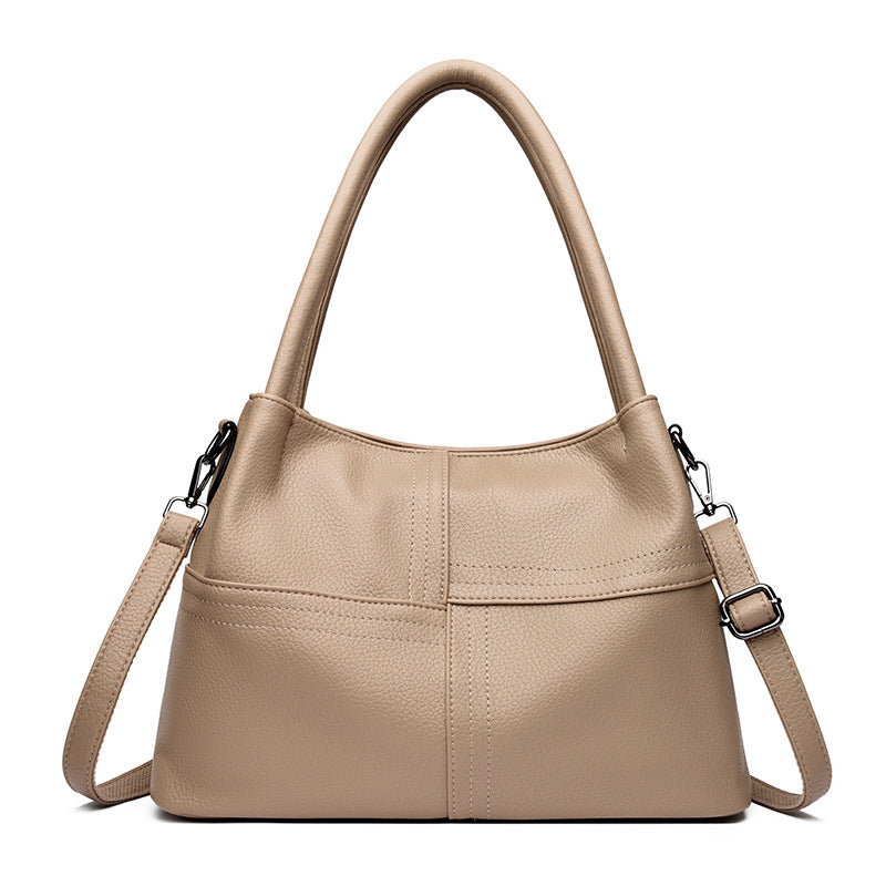Bolso de mano de piel suave con textura de patchwork para mujer.