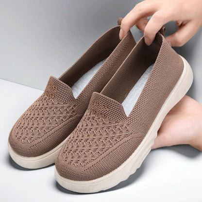 Zapatos de malla transpirables y cómodos con punta redonda.