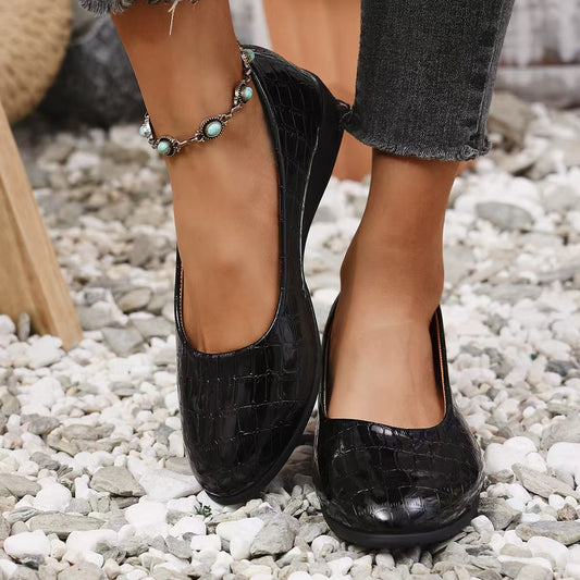 Zapatos de piel puntiagudos con estampado de cocodrilo