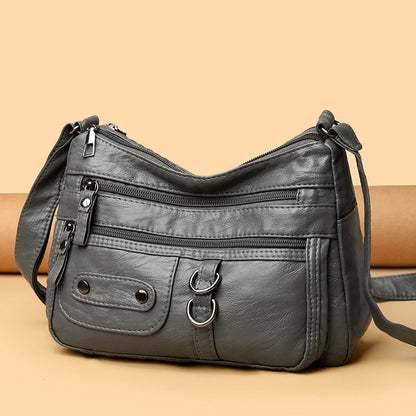 Bolso de piel con doble anilla