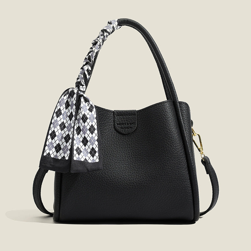 Nuevo bolso minimalista y elegante con estampado de lichi.