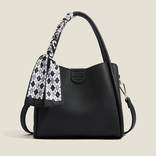 Nuevo bolso minimalista y elegante con estampado de lichi.
