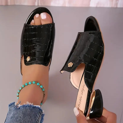 Zapatos de piel de cocodrilo con tacón alto y boca de pez