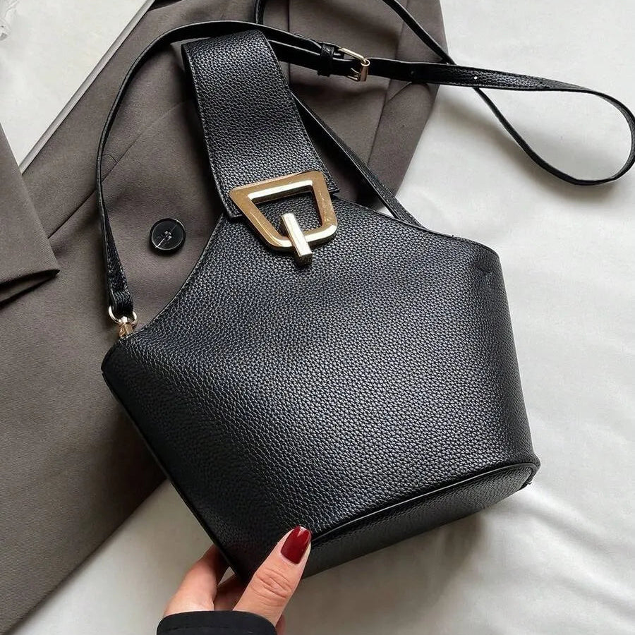 Un bolso de mano de cuero artificial elegante y multifuncional con una correa de hombro ajustable y portátil