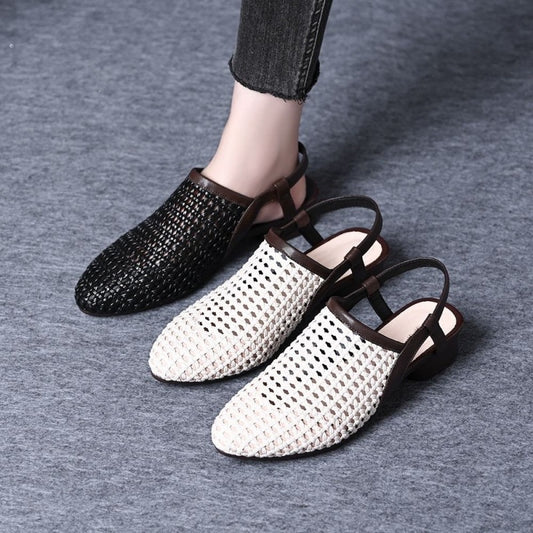 Sandalias caladas de cuero suave de tacón bajo