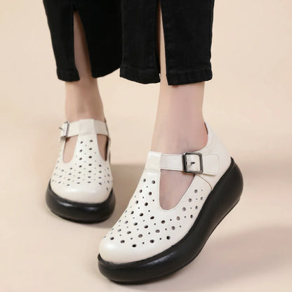 Zapatos de suela blanda vintage y de moda con diseño calado para mujer