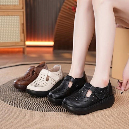 Zapatos de suela blanda vintage y de moda con diseño calado para mujer